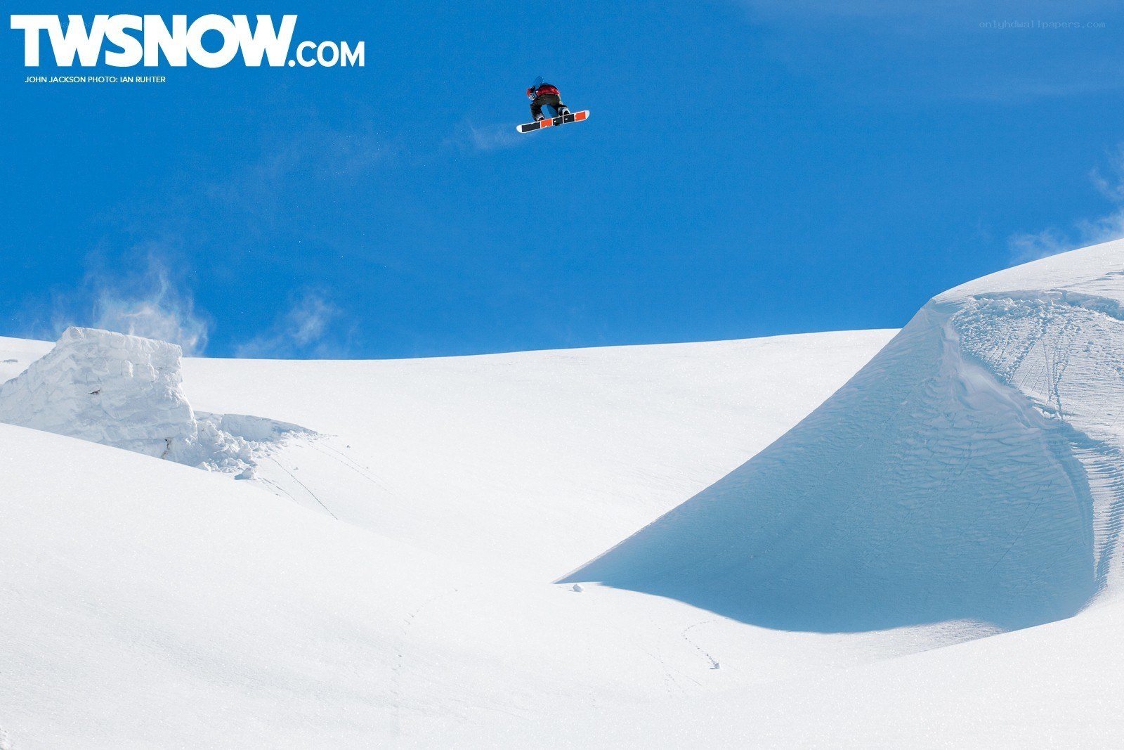 Snowboarder in mid-air jump