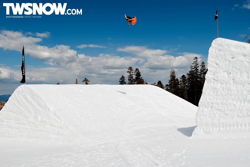 Snowboarder in mid-air jump