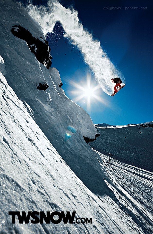 Snowboarder in mid-air jump