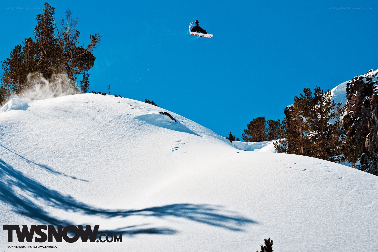 Snowboarder in mid-air jump