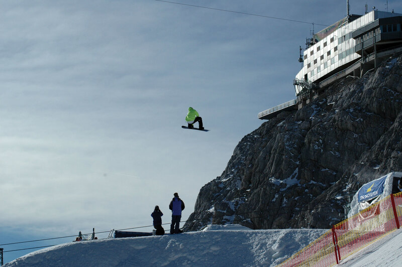Snowboarder in mid-air jump
