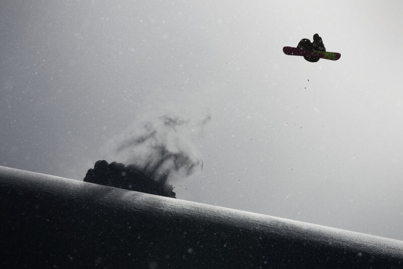 Snowboarder in mid-air jump
