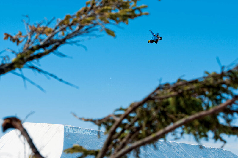 Snowboarder in mid-air jump