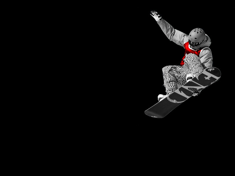 Snowboarder in mid-air jump