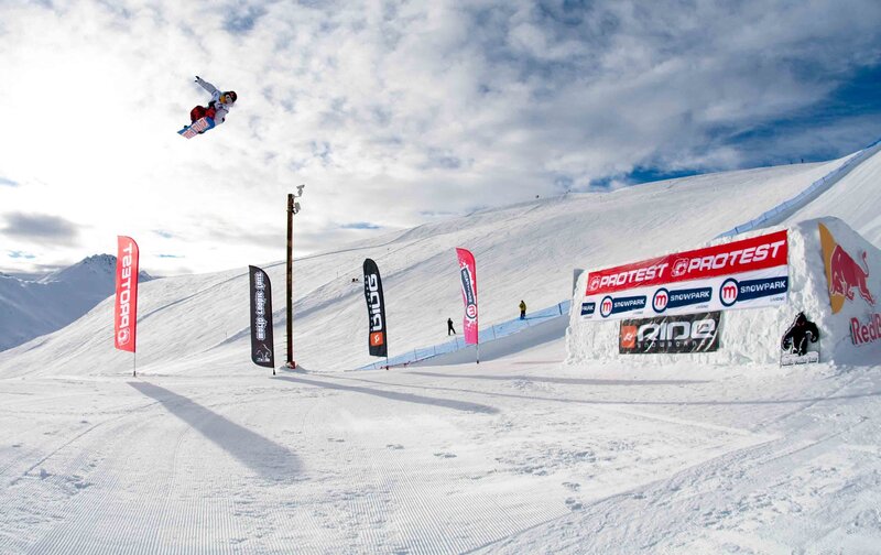 Snowboarder in mid-air jump