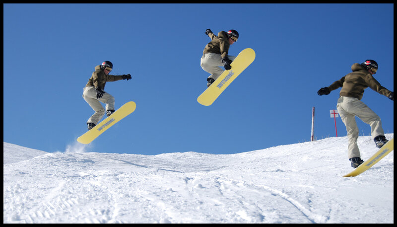 Snowboarder in mid-air jump