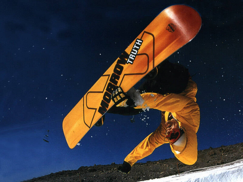 Snowboarder in Mid-air — Orange, Dramatic