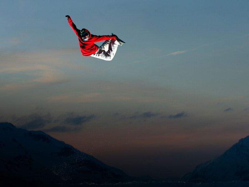 Snowboarder in Mid-air — Red, Dramatic
