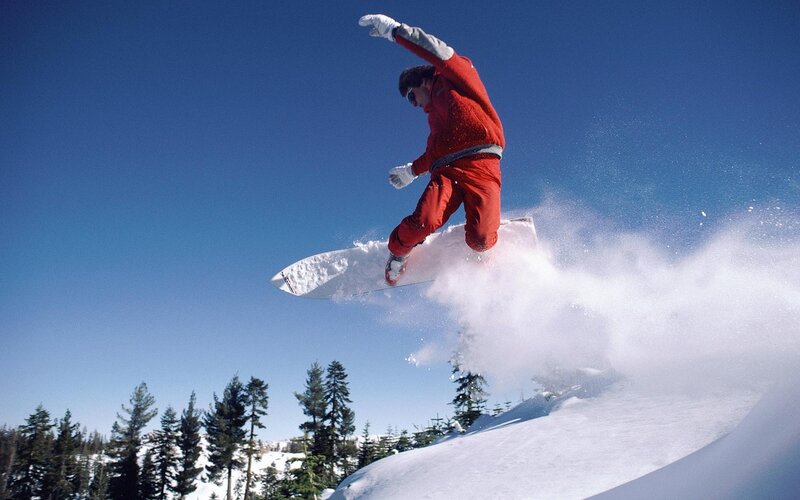 Snowboarder in Mid-air — Red