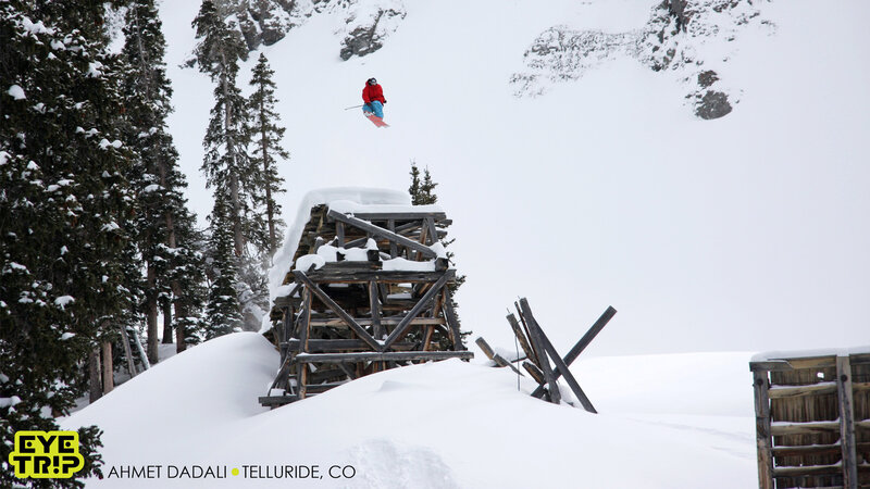 Snowboarder in Mid-air — White, Active, Winter, Photograph, Snow-covered Trees, Wooden Structure