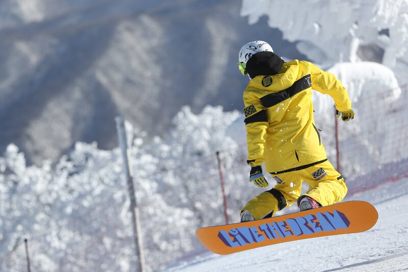 Snowboarder in Mid-air — Yellow