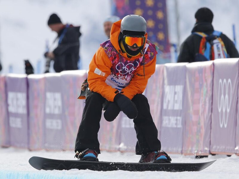 Snowboarder in Orange Jacket
