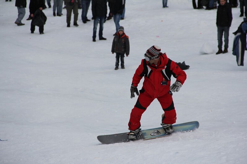 Snowboarder in Red Suit — Active
