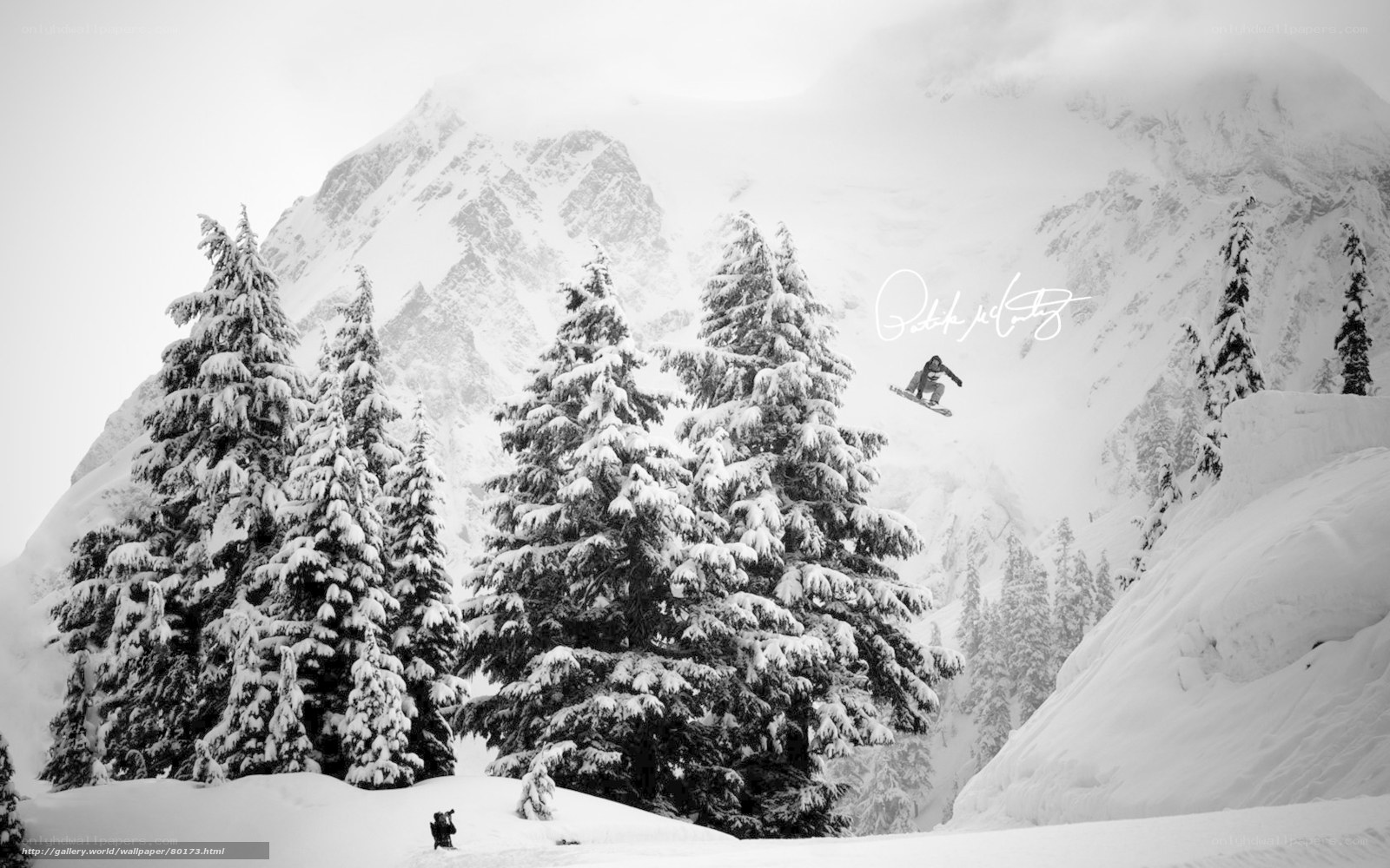 Snowboarder in snowy mountains