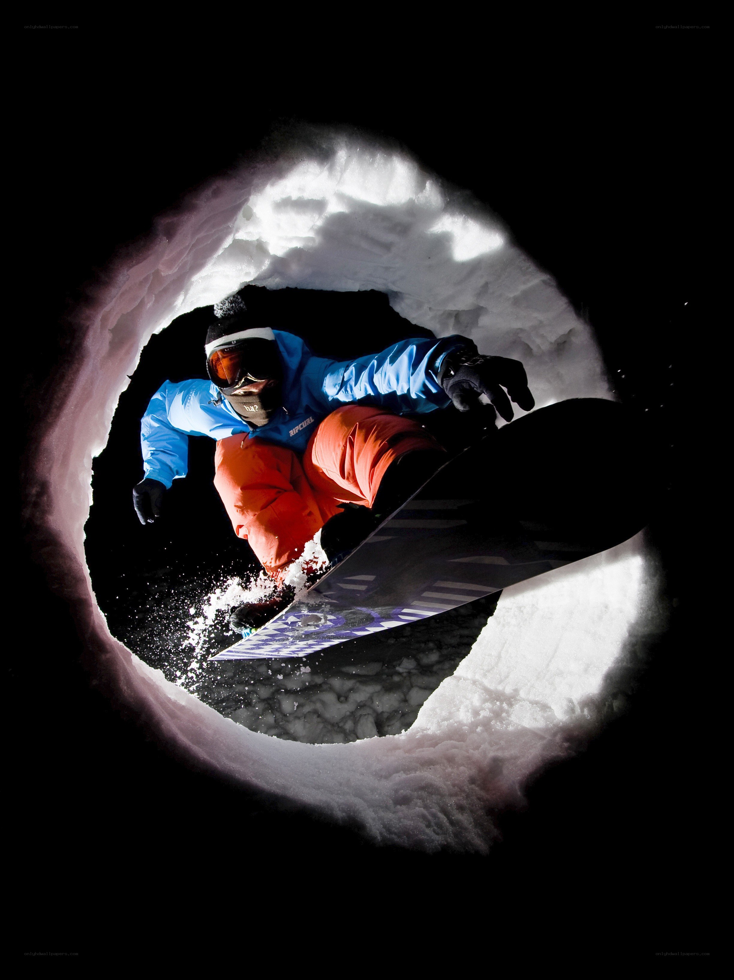 snowboarder in tunnel