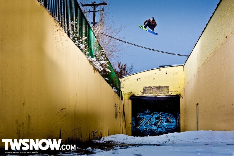 Snowboarder in urban alley