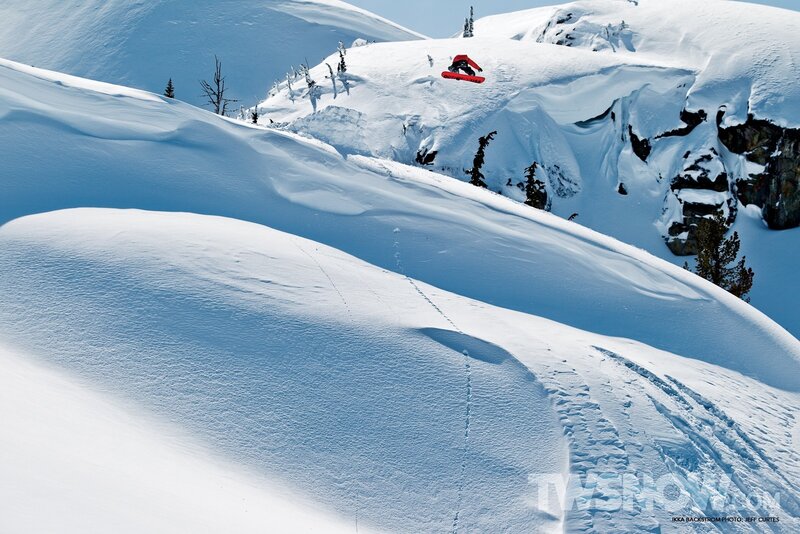 Snowboarder mid-air jump