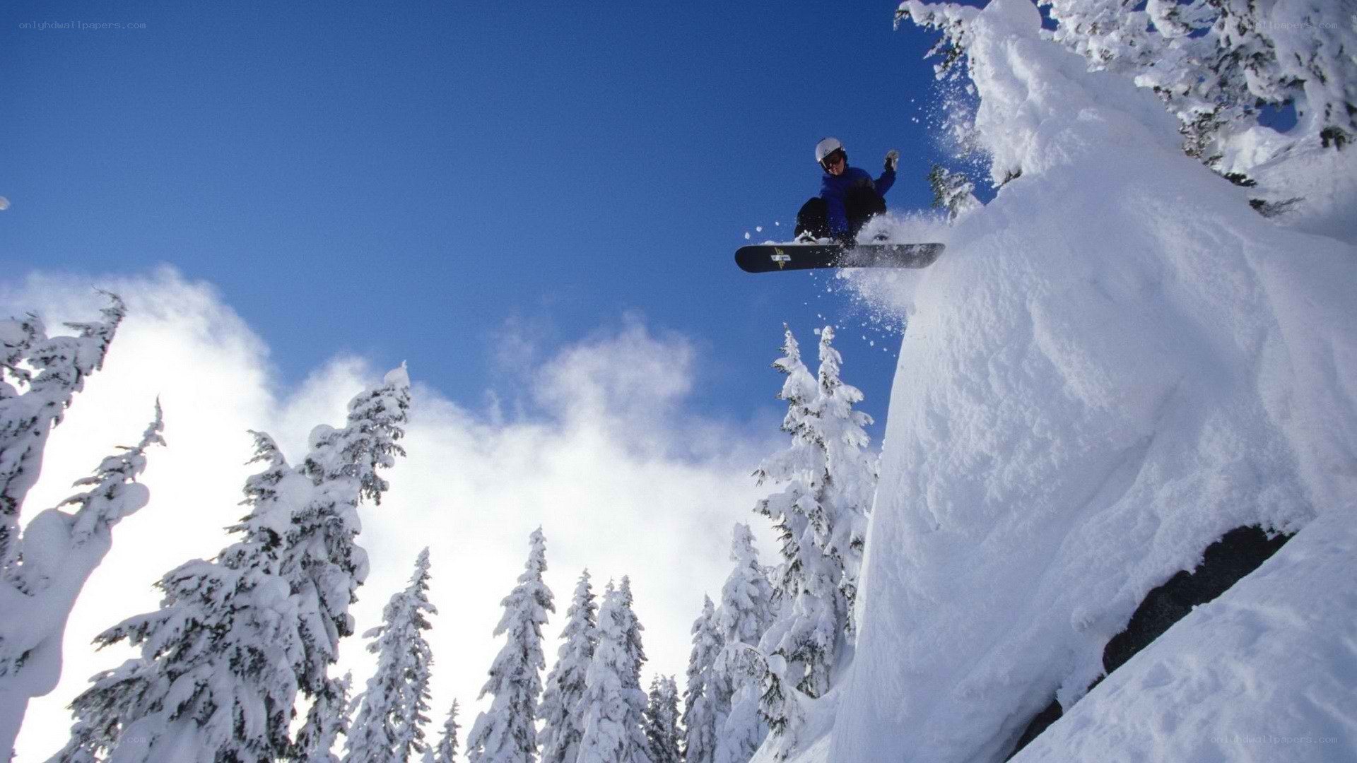 Snowboarder mid-air jump