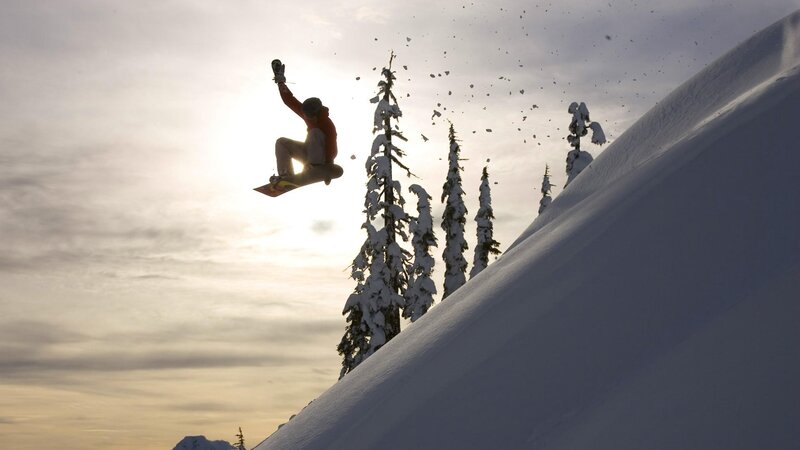 Snowboarder mid-air jump
