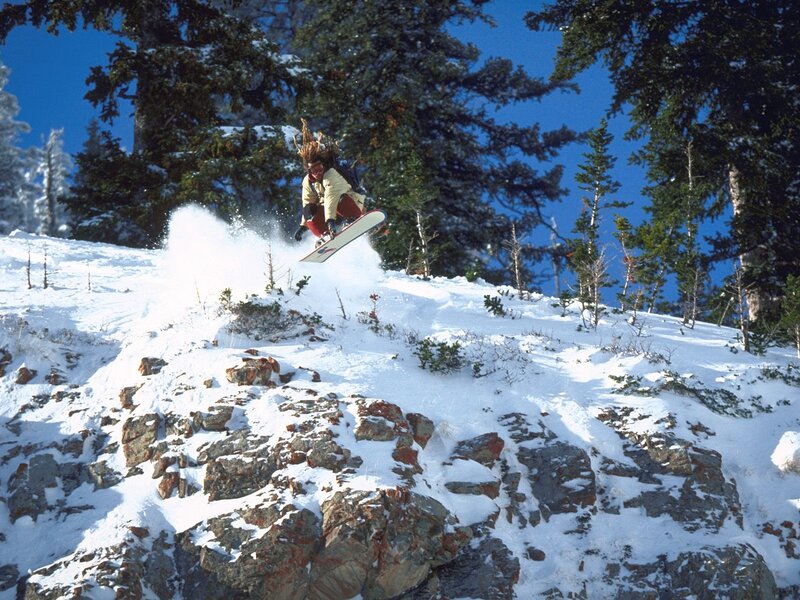 Snowboarder mid-air jump