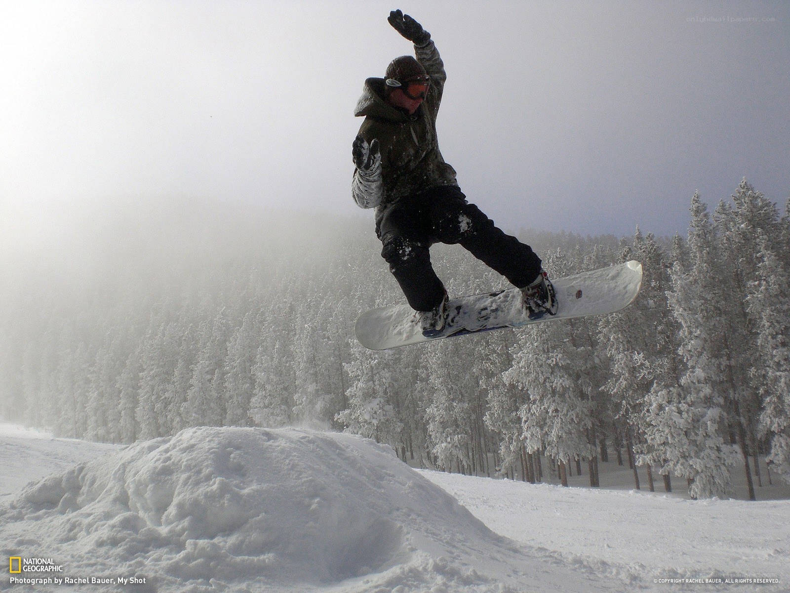 Snowboarder mid-air jump