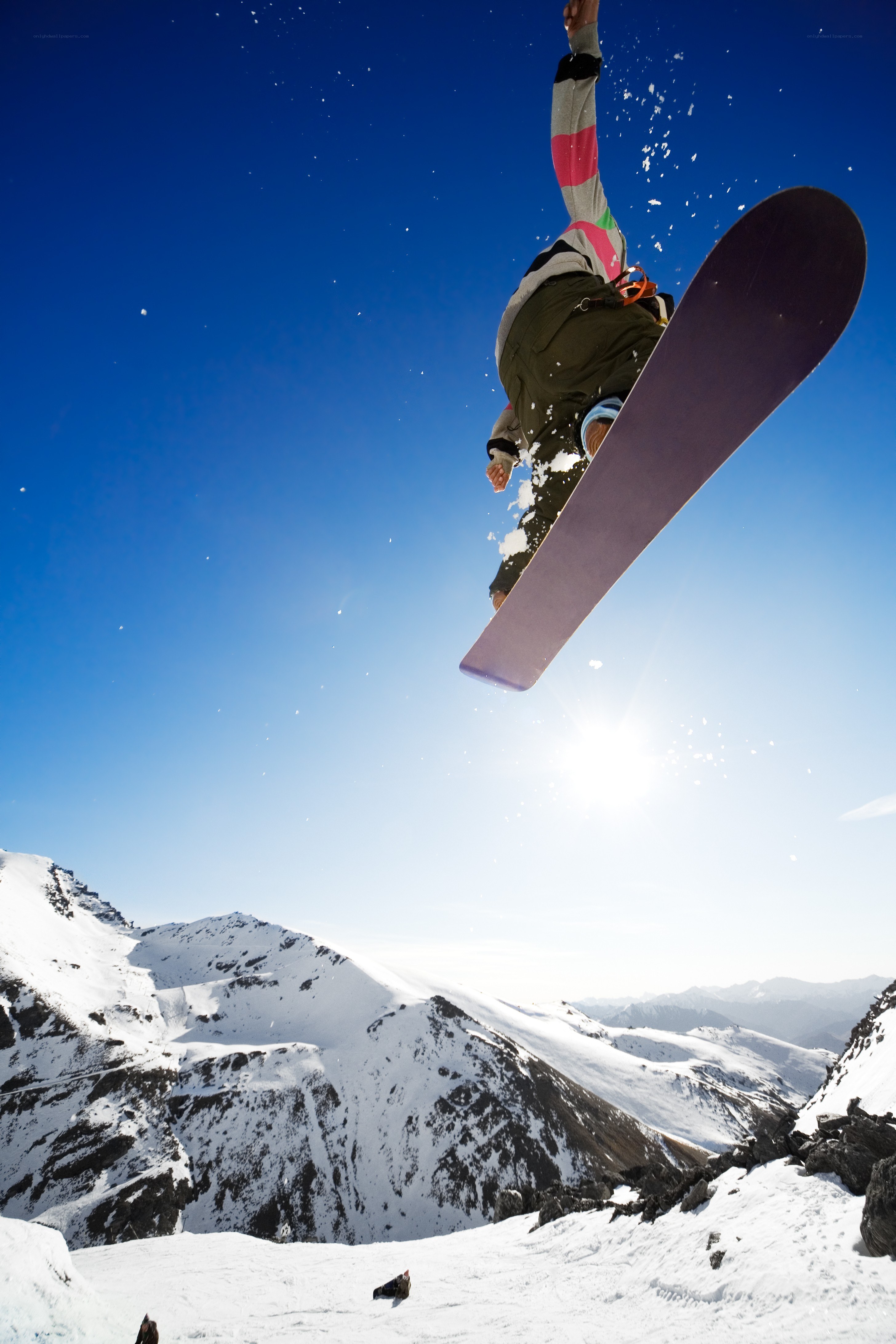 Snowboarder mid-air jump