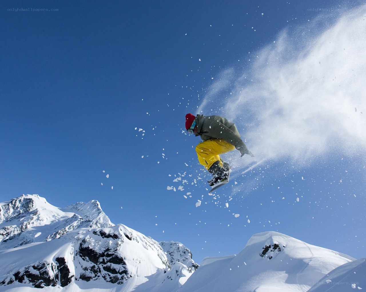 Snowboarder mid-air jump