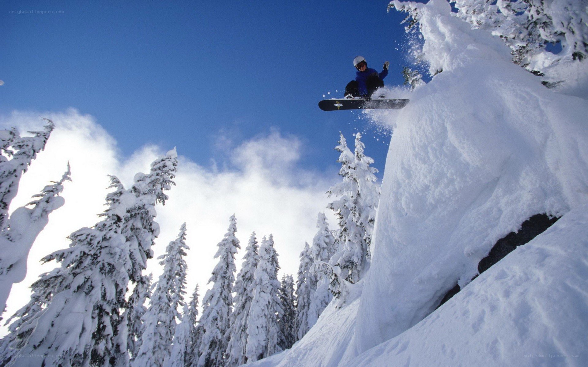 Snowboarder mid-air jump