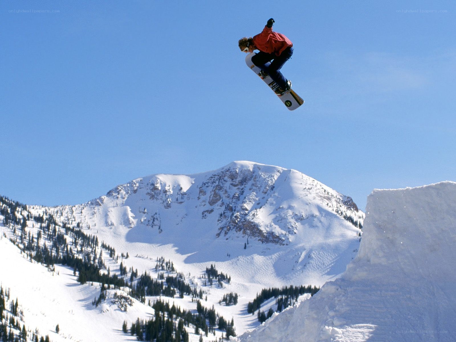 Snowboarder mid-air jump