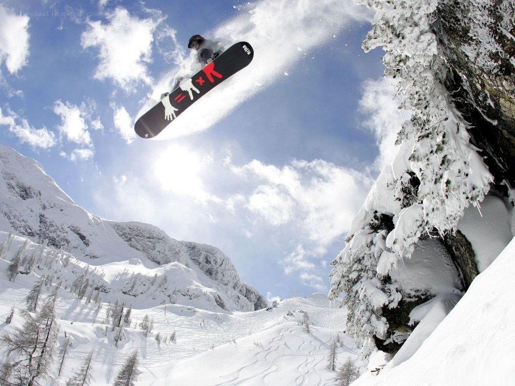 Snowboarder mid-air jump