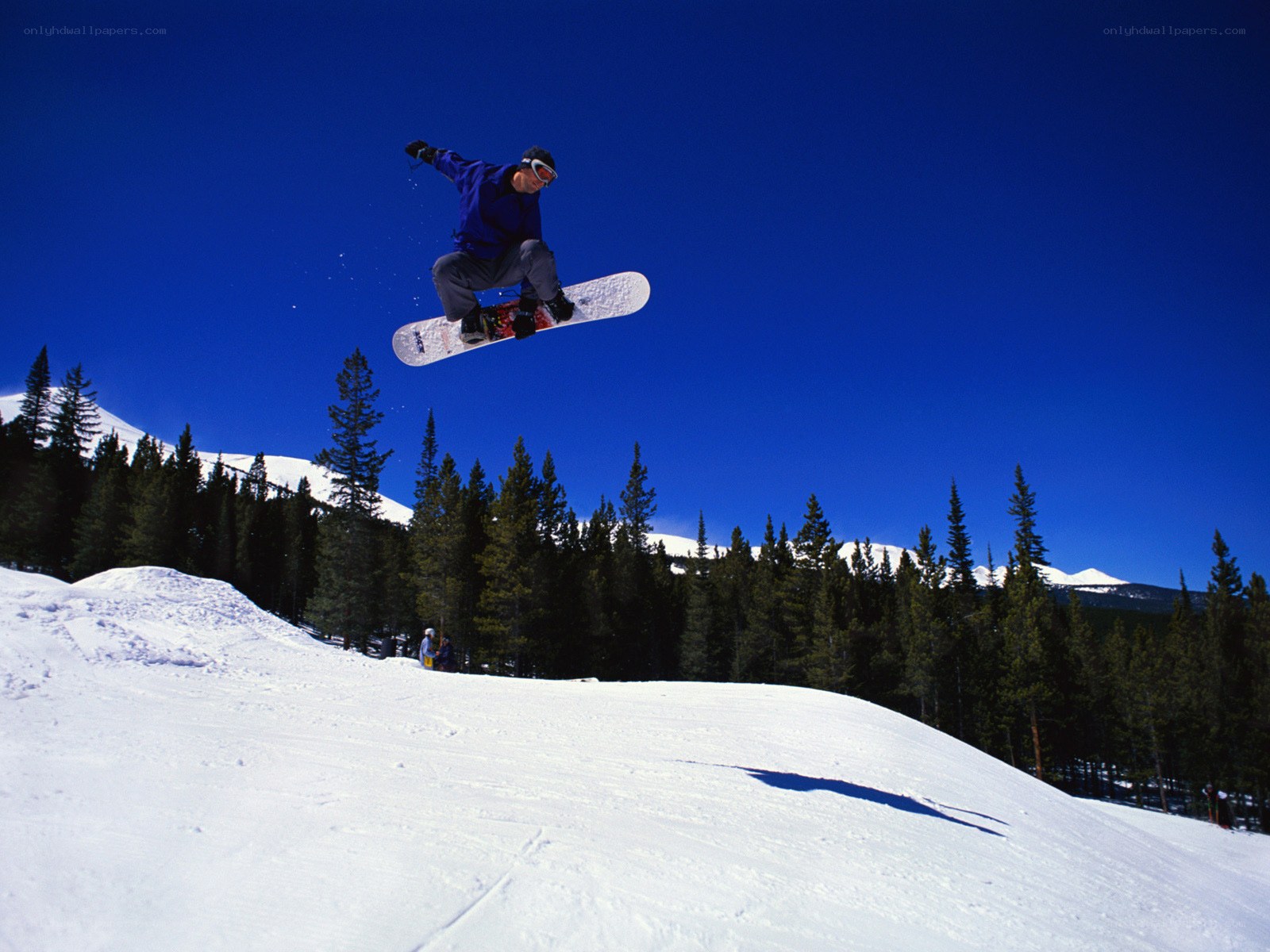 Snowboarder mid-air jump