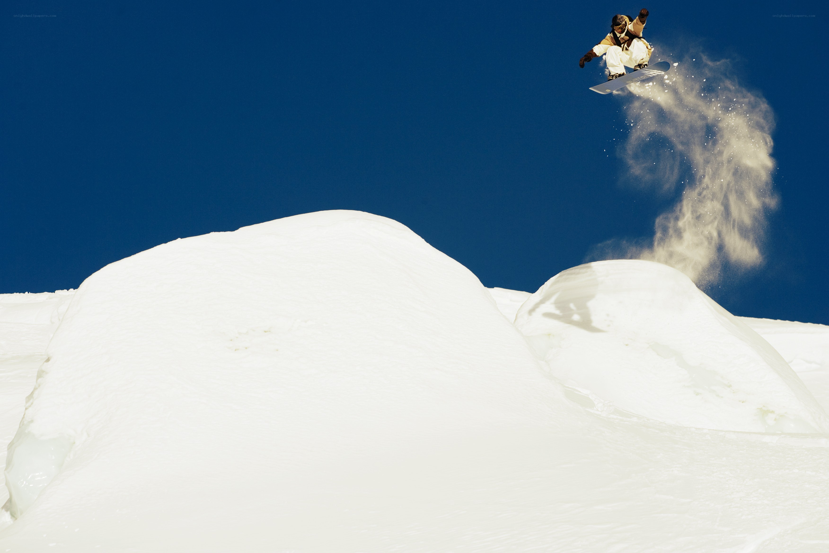 Snowboarder mid-air jump