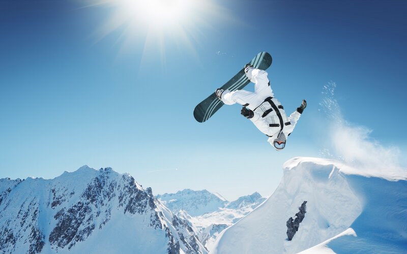 Snowboarder Mid-air Jump — Blue, Dramatic, Afternoon, Photograph, Mountains, Sun