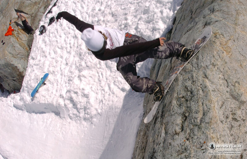 Snowboarder on a cliff