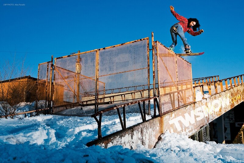 Snowboarder on a rail