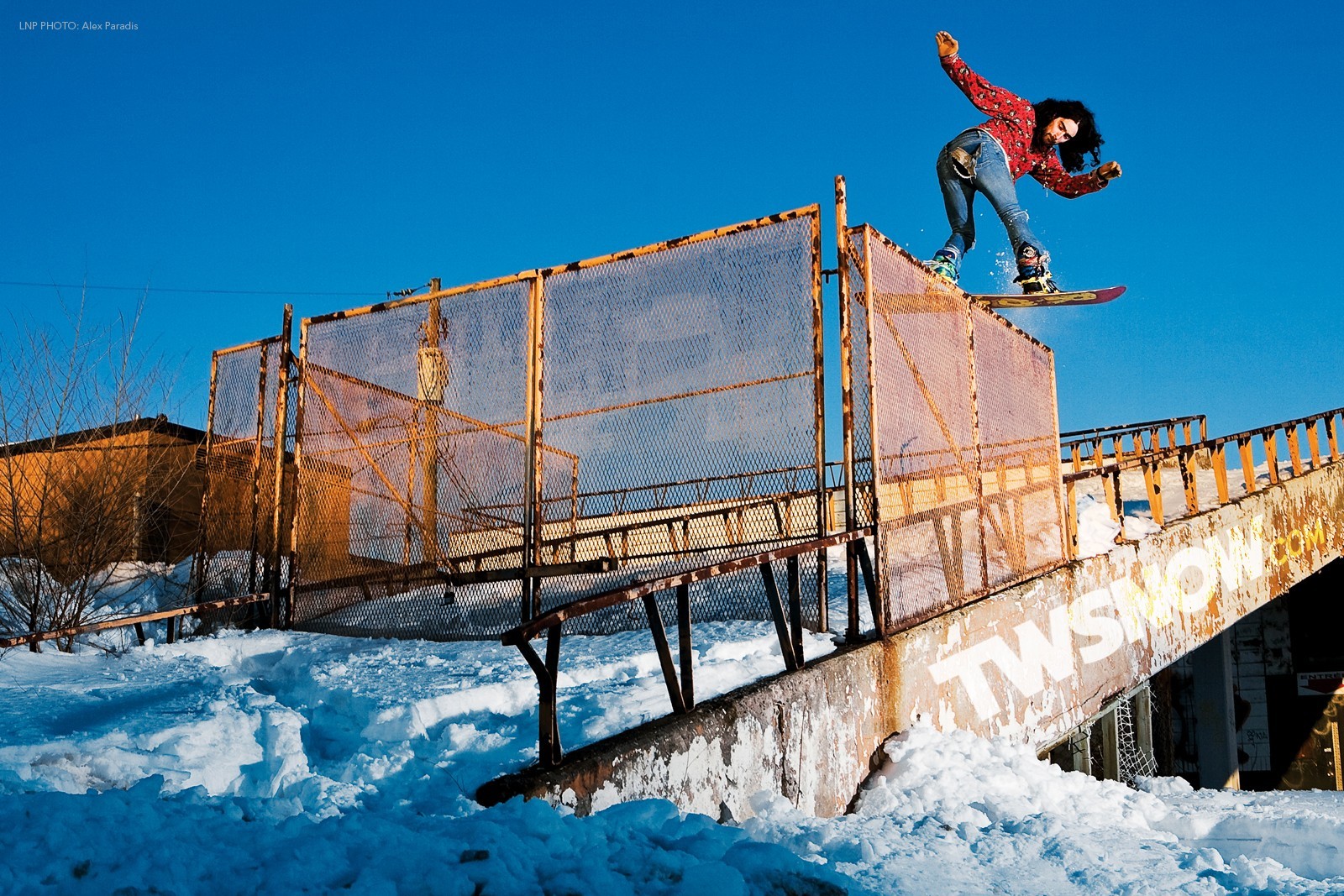 Snowboarder on a rail