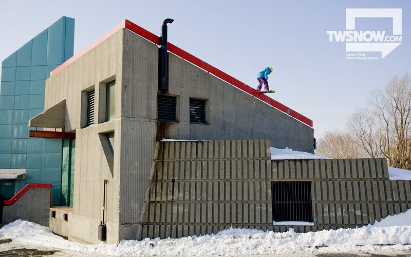Snowboarder on a roof