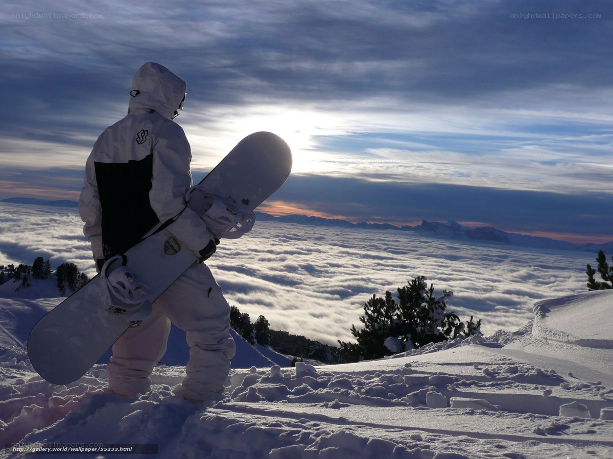 Snowboarder on a snowy peak