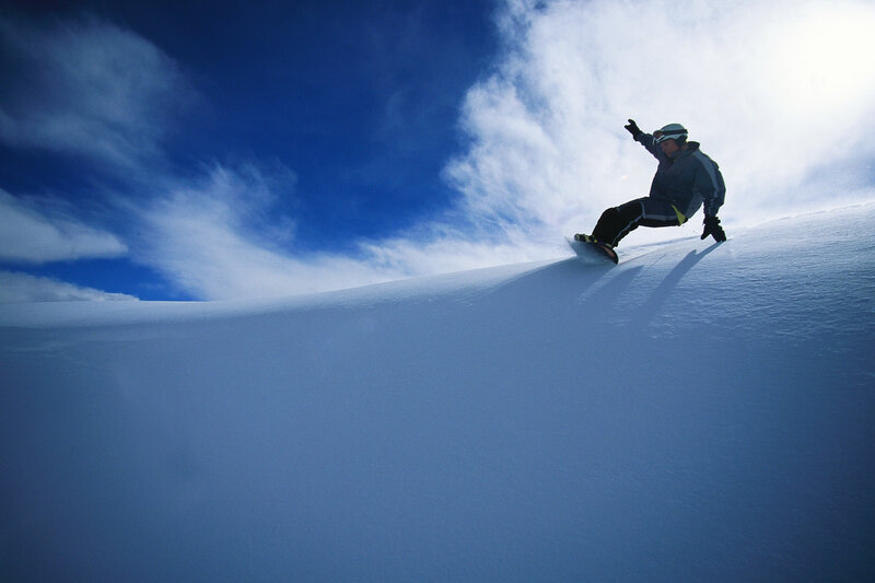 Snowboarder on a snowy slope