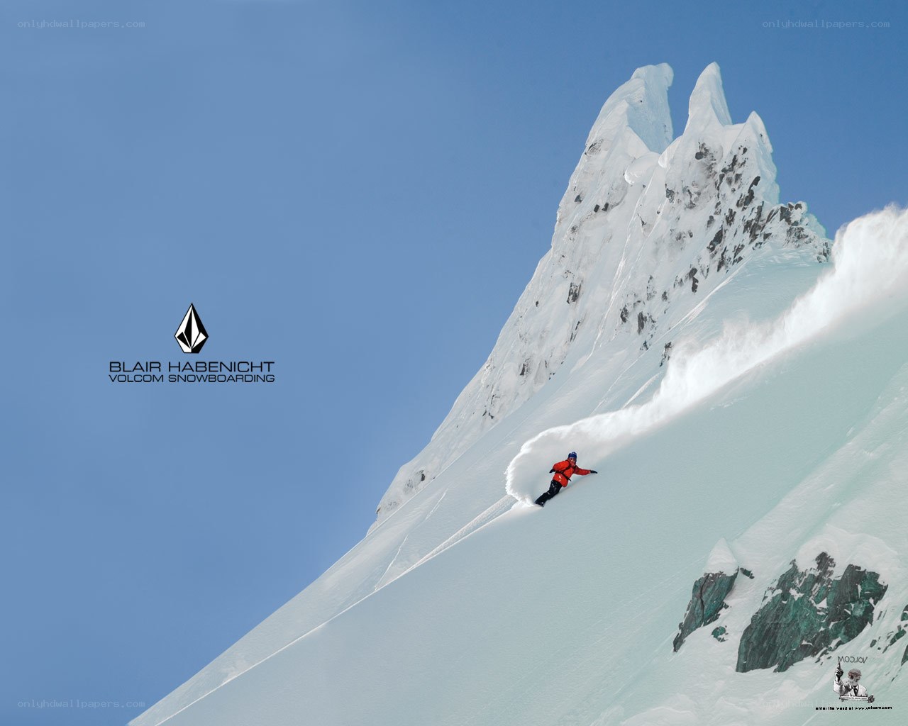 Snowboarder on a steep slope