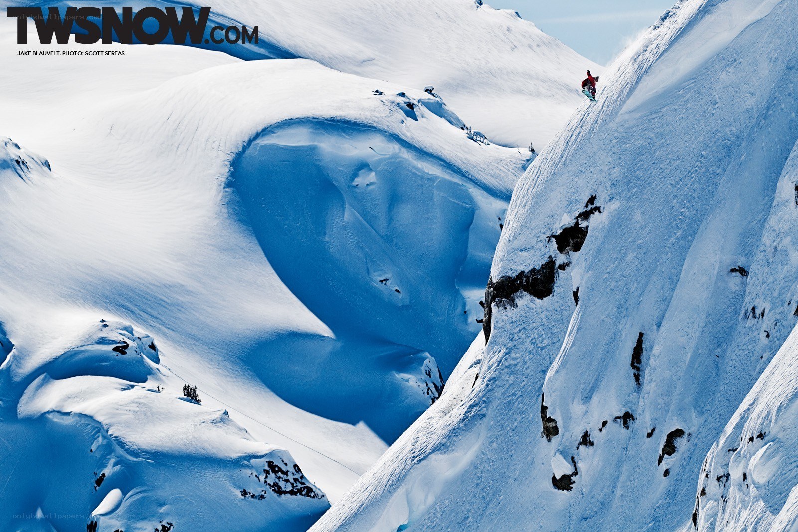Snowboarder on a steep slope