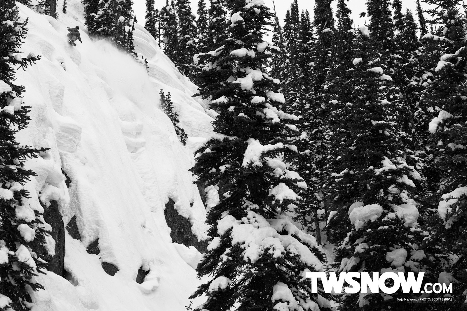 Snowboarder on a steep slope