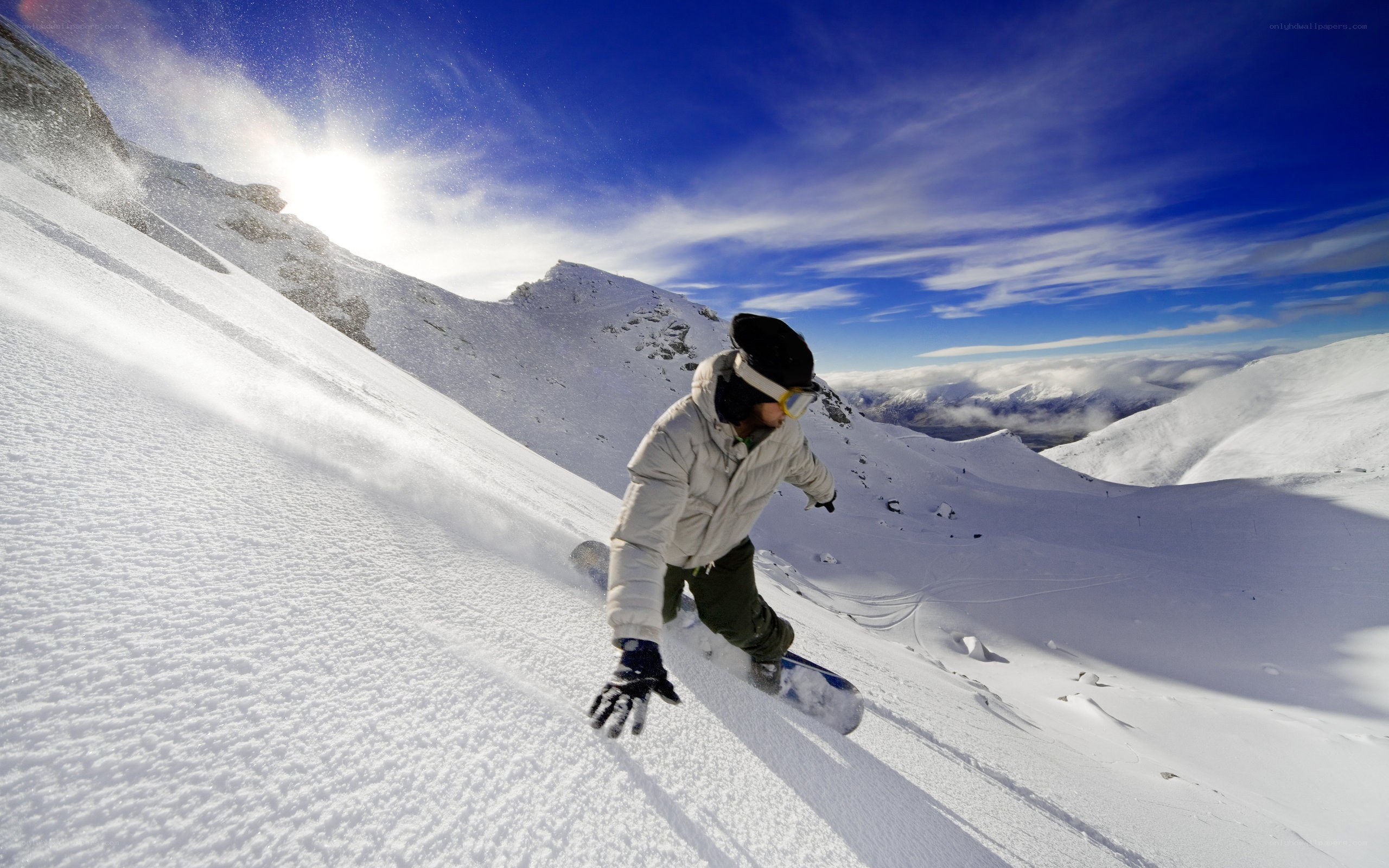 Snowboarder on a sunny mountain