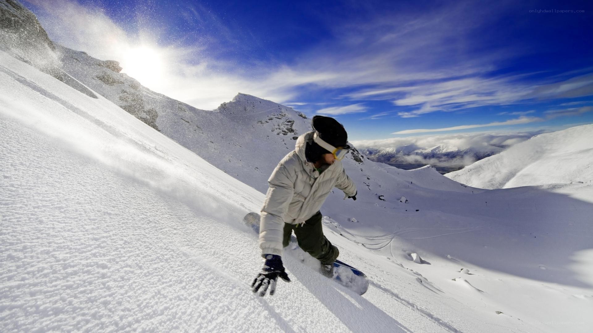 Snowboarder on a sunny mountain