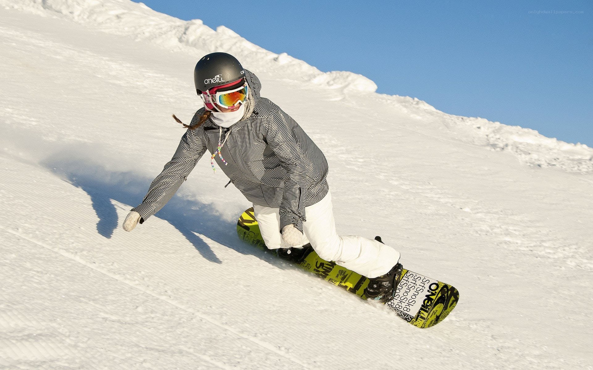 Snowboarder on a sunny slope