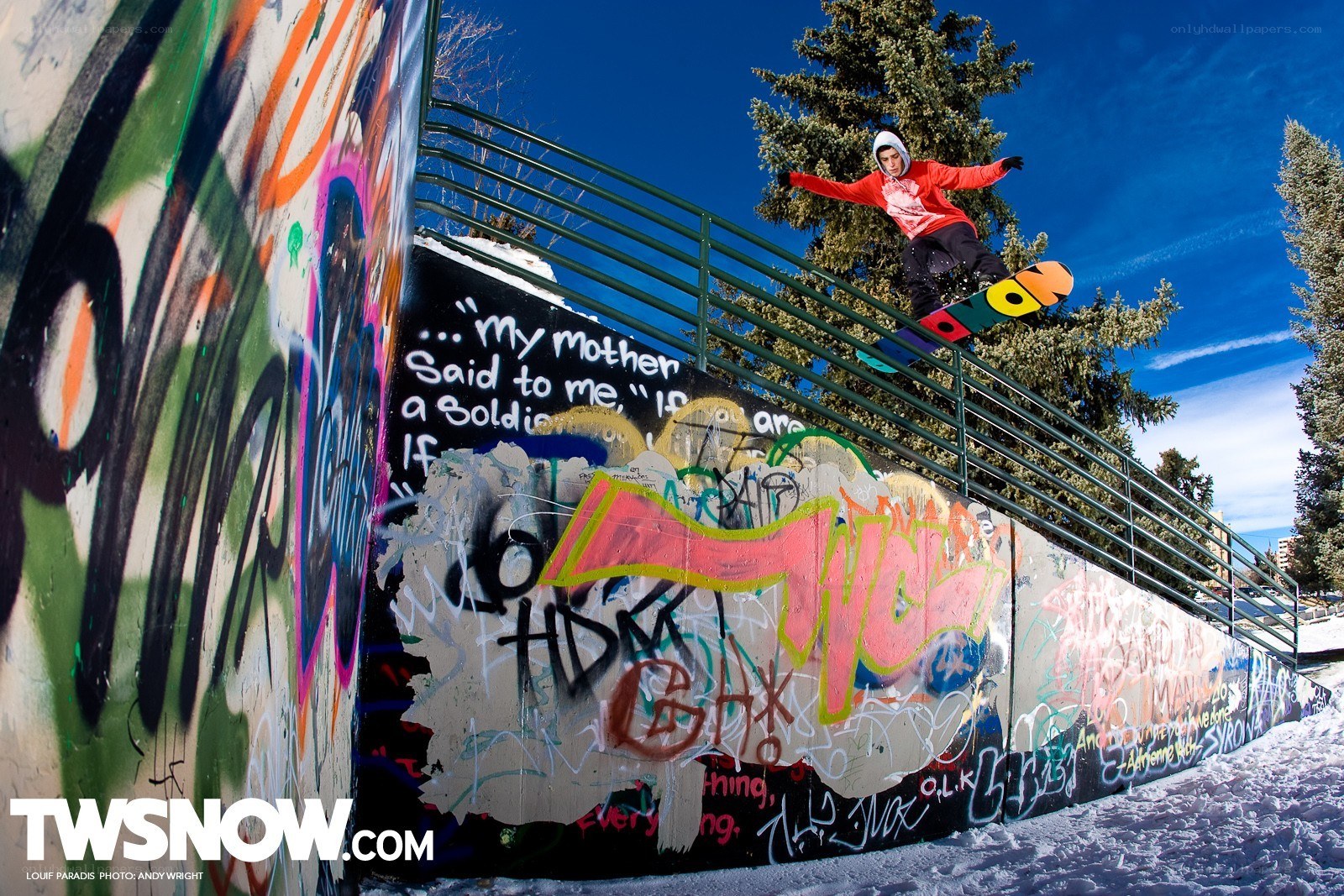 snowboarder on graffiti wall