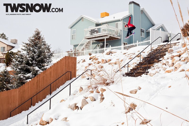 snowboarder on rail