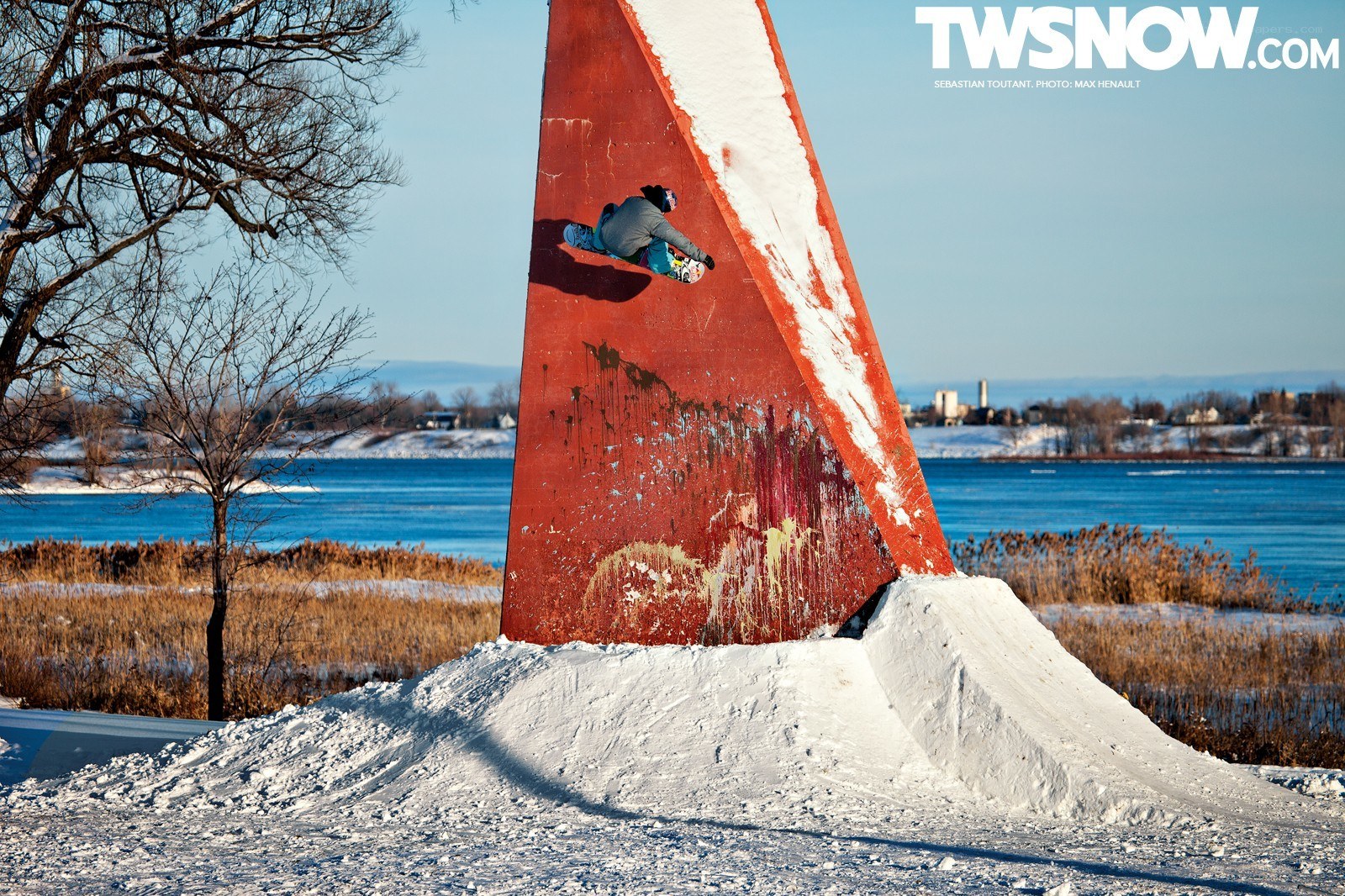 Snowboarder on red ramp