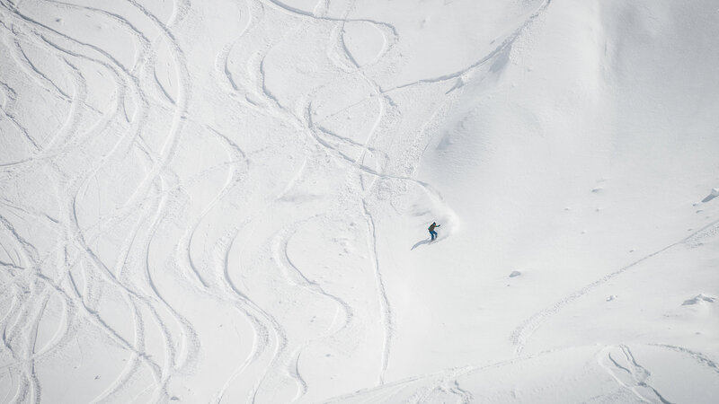Snowboarder on Slope — White, Serene, Winter