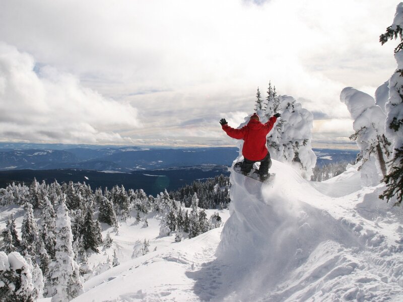 Snowboarder on Snowy Peak — White